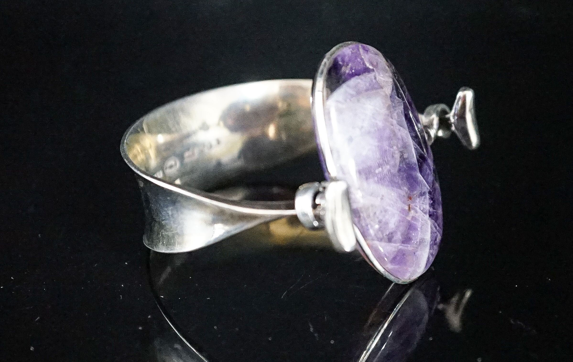 A Vivianna Torun for Georg Jensen sterling and amethyst quartz set openwork bangle, no 203, stone length approx. 43mm.